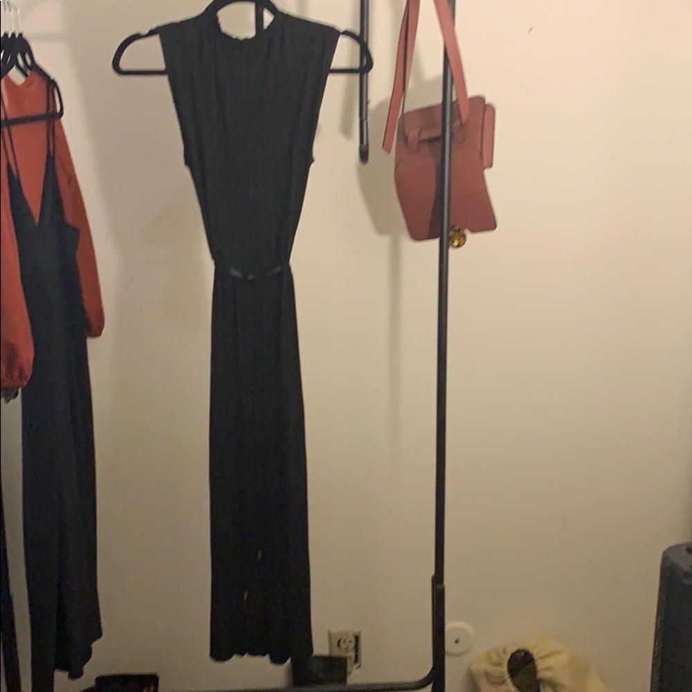 Black pleated sleeveless high neck dress